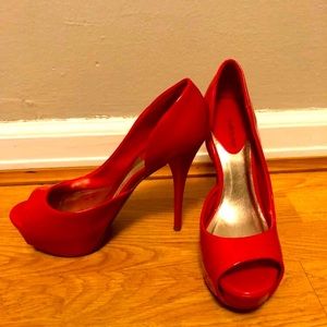 Red high heel pumps